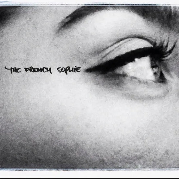 eye portrait in black and white with the name of the artist " the French Sophie"